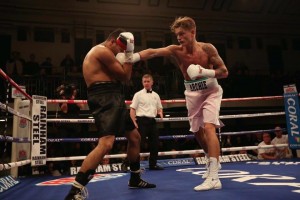 20-year old professional boxer Archie Sharp using the jab in his third bout in York Hall in January 2016.